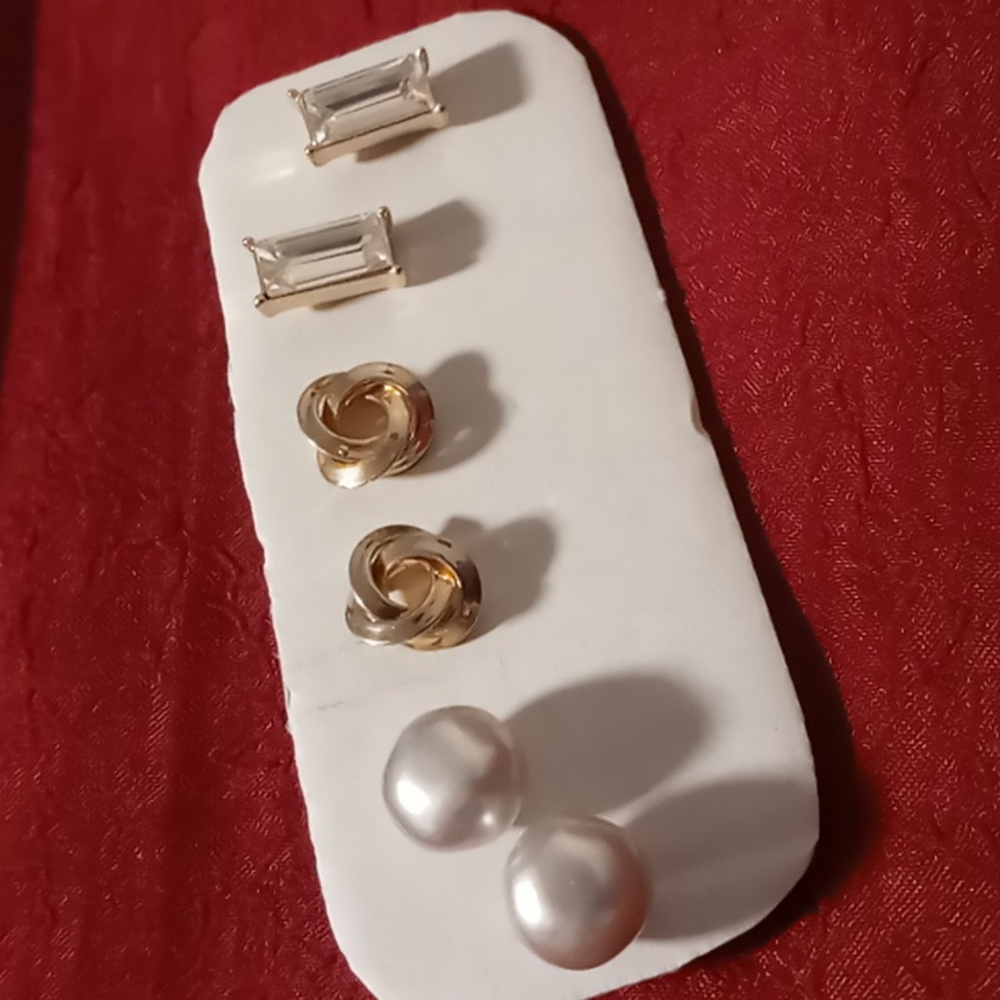 Three pair of Designer stud earrings, gently used, excellent condition.